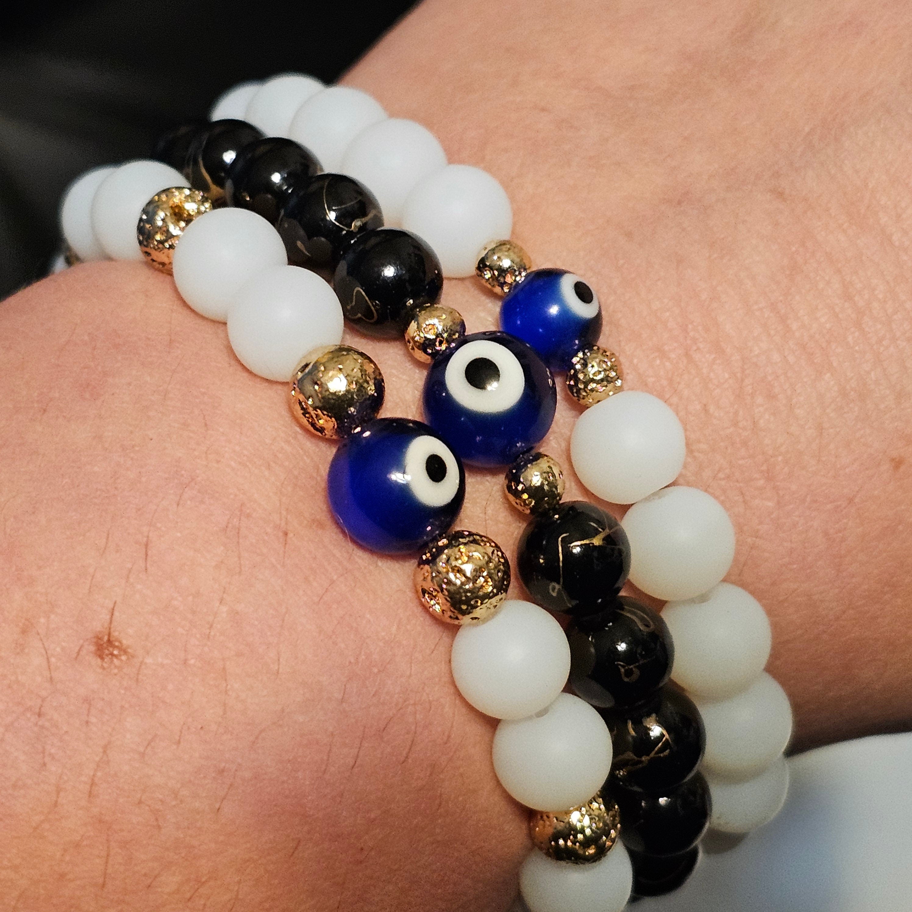 Evil Eye Protection Bracelet: Glass Beads & Gold Hematite Accent Beads in Gold Tone