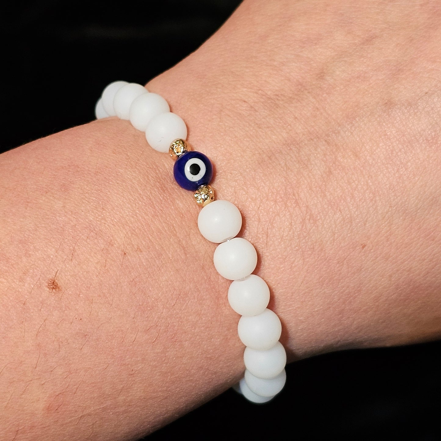 Evil Eye Protection Bracelet: Glass Beads & Gold Hematite Accent Beads in Gold Tone