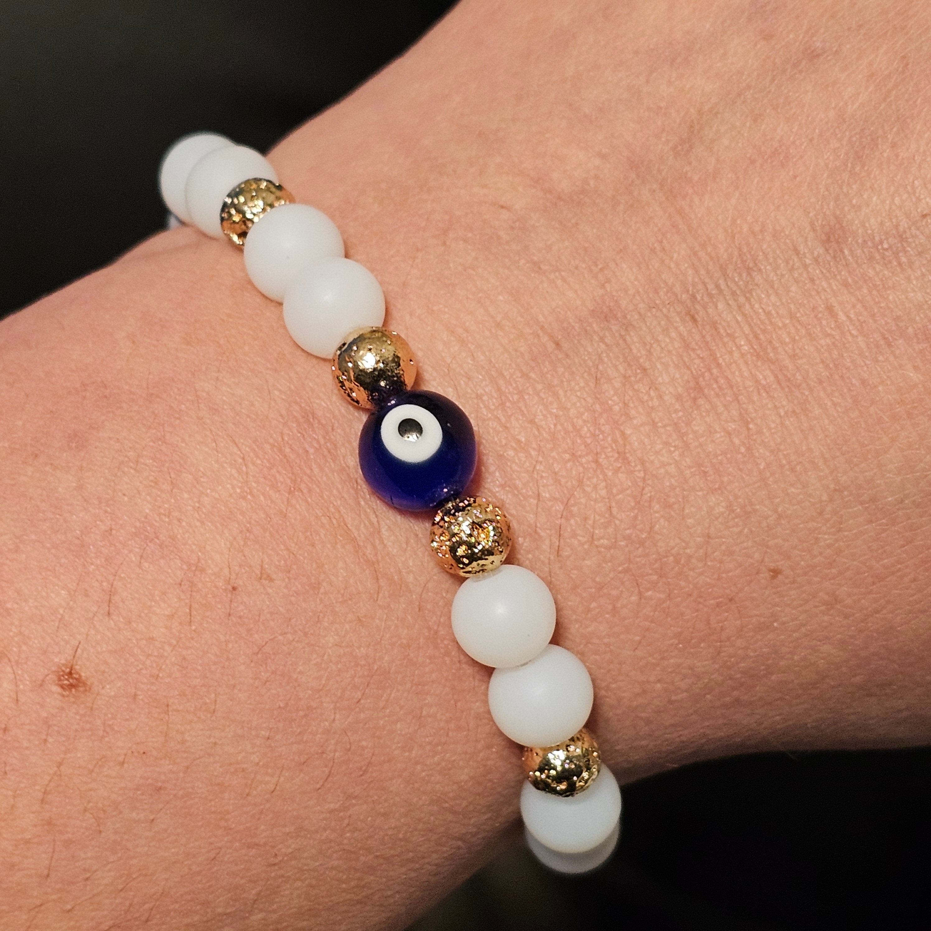 Evil Eye Protection Bracelet: Glass Beads & Gold Hematite Accent Beads in Gold Tone