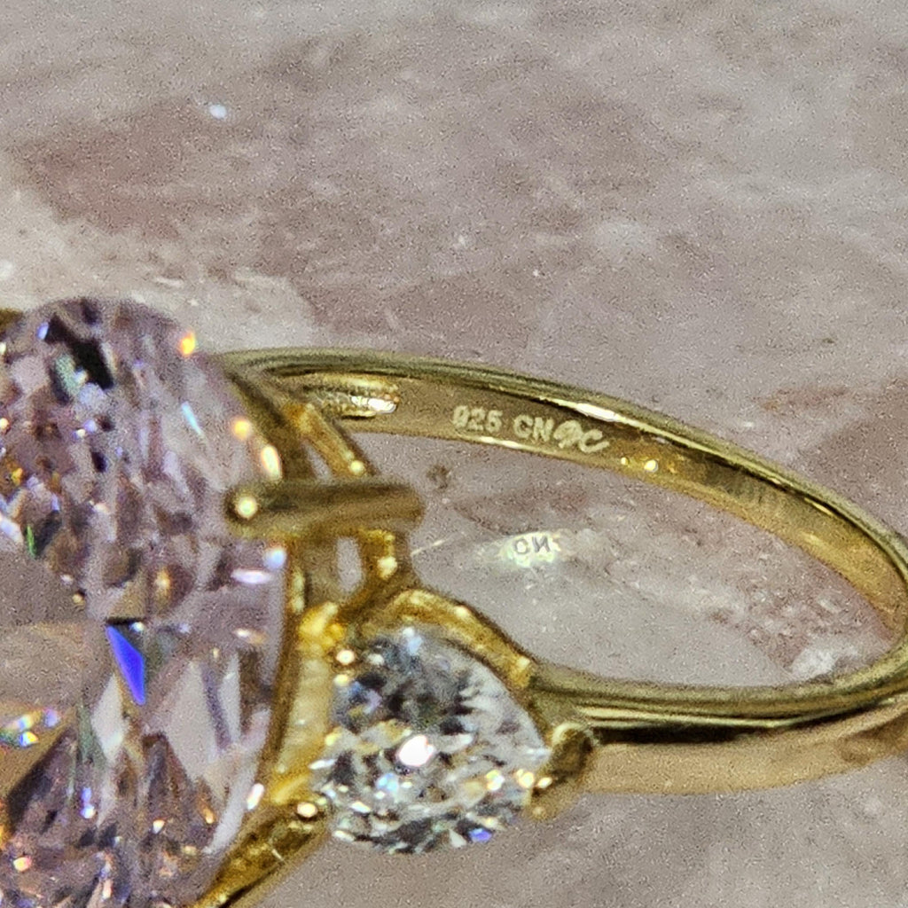 Oval Lab Rose Quartz Ring: Gold Plated Sterling Silver, Size 8