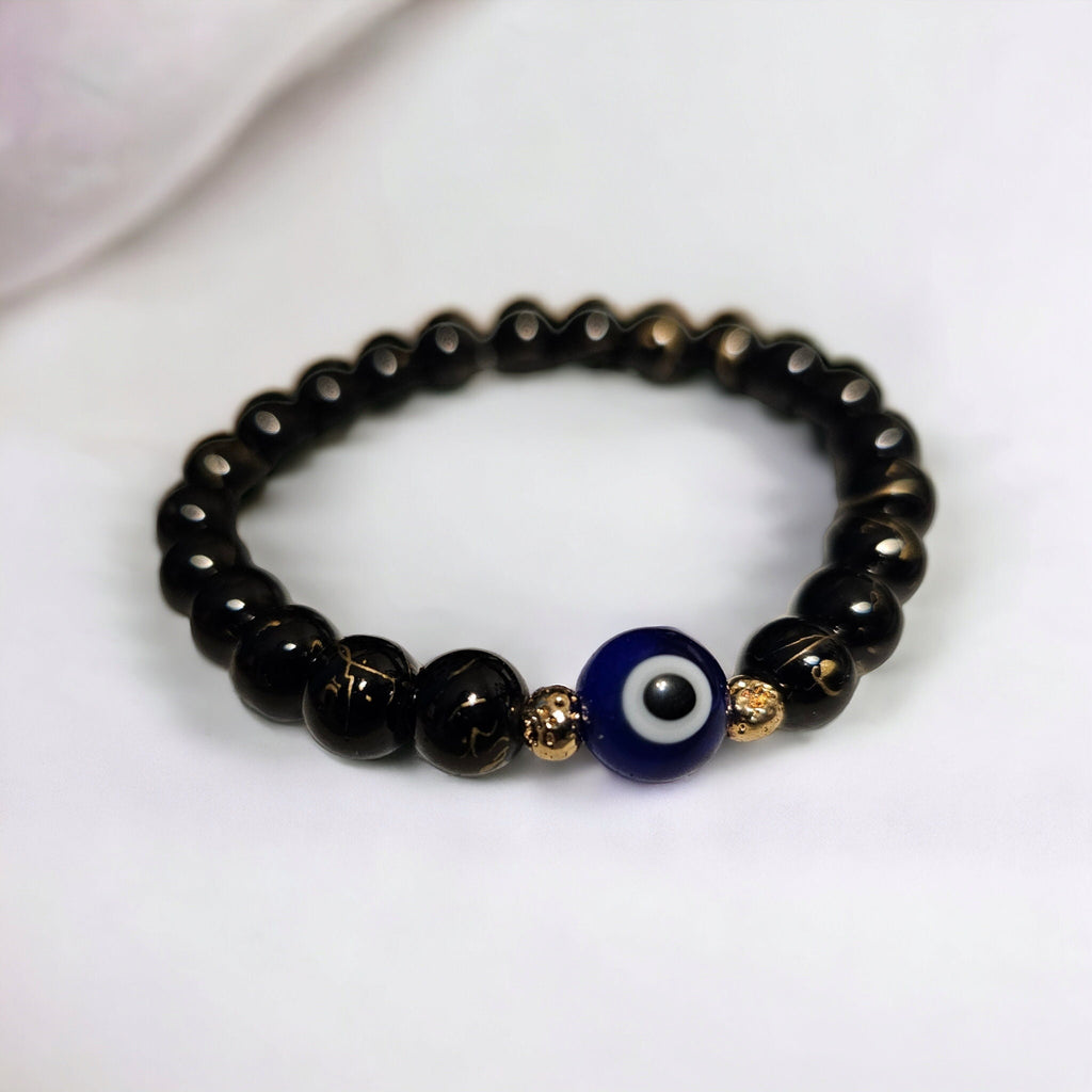 Evil Eye Protection Bracelet: Glass Beads & Gold Hematite Accent Beads in Gold Tone